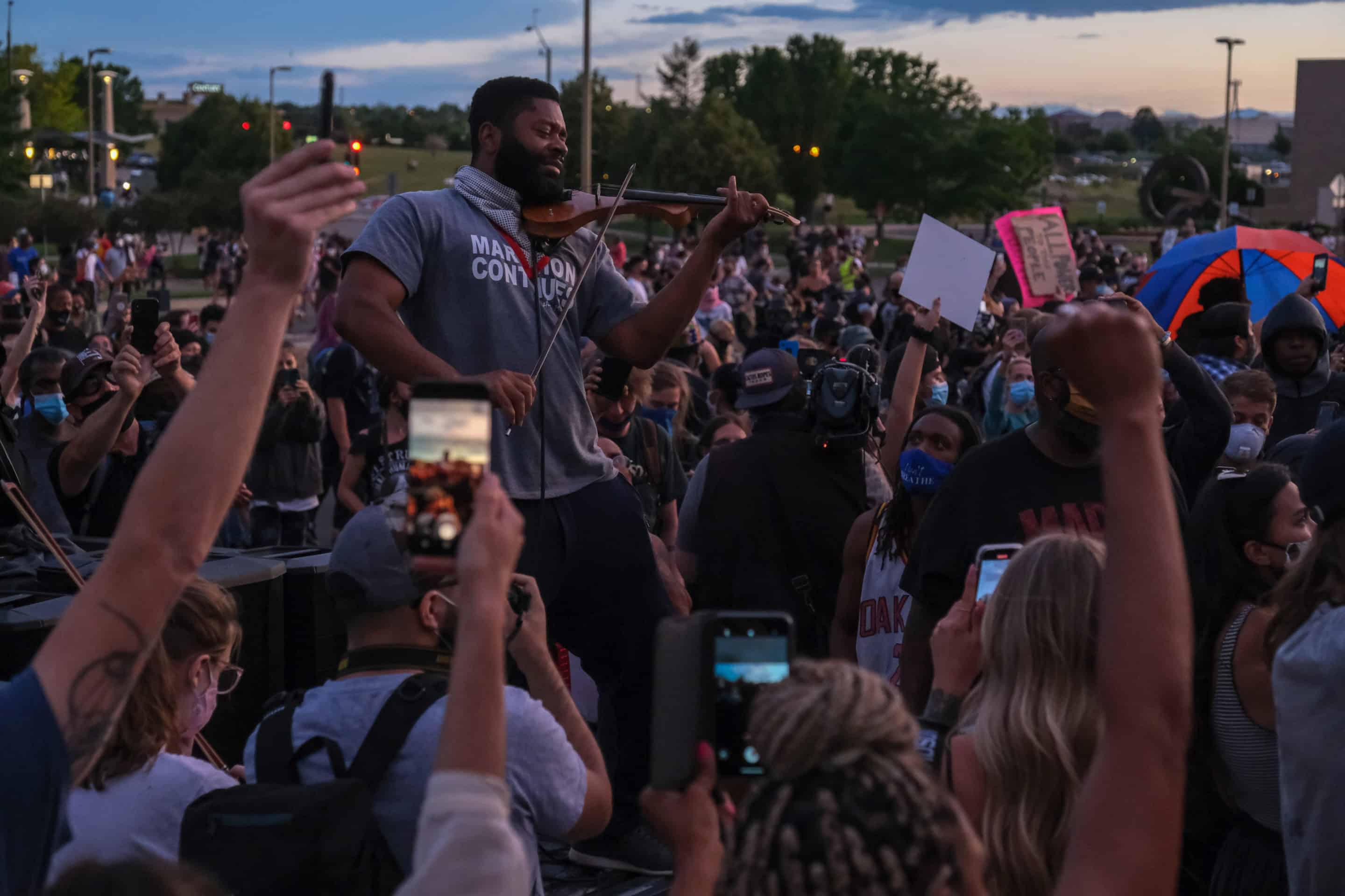 Protesters debate paths to justice for Elijah McClain