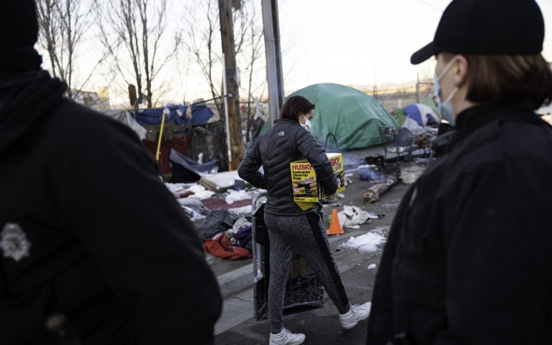 Early morning encampment sweep upends life for more than 100 houseless Denver residents