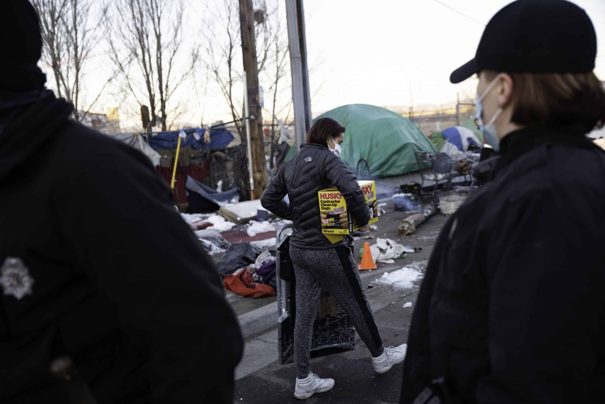 Early morning encampment sweep upends life for more than 100 houseless Denver residents